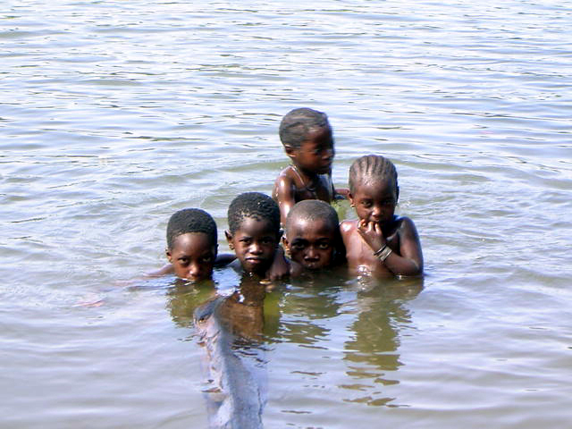 Swimming children Guinea